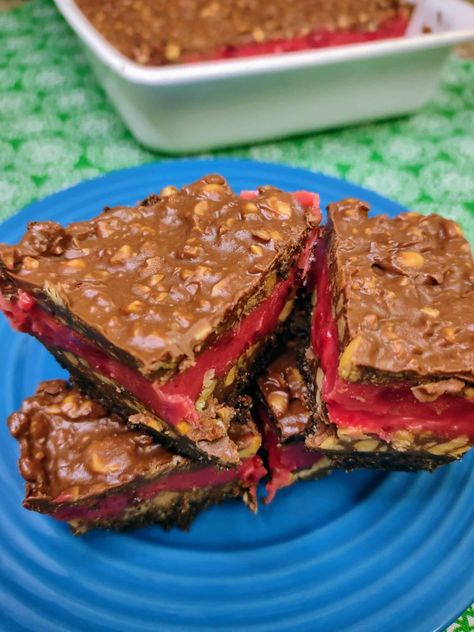 These delicious bars are based on a candy found mainly in the Midwest. Also known as Twin Bings or Cherry Mash, these unexpected flavors combine for a sweet treat Twin Bing Recipe, Cherry Bing Bars, Bing Bars, Graham Cracker Crust Recipe, Candy Bar Recipe, Cherry Bars, Bing Cherries, Chunky Peanut Butter, Chocolate Graham Crackers