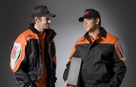 TNT delivery men in uniform Delivery Uniform, Men's Uniform, Logistics Company, Men's Uniforms, Reflective Vest, Parcel Delivery, Corporate Identity Design, Uniform Fashion, Design Challenge