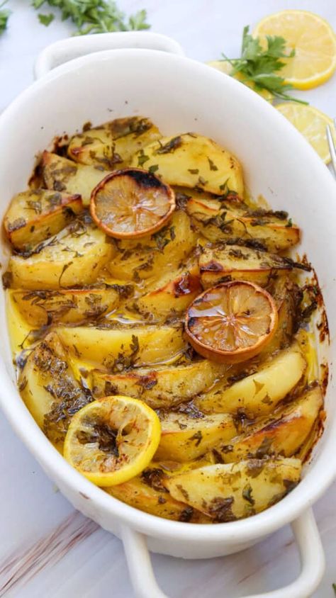 Greek Lemon Potatoes are perfectly roasted in a lemon, oregano, and garlic broth resulting in a tender, flavorful side dish. This easy potato recipe is a delicious side dish that adds a Mediterranean twist to any meal. Greek Side Dishes, Garlic Broth, Greek Roasted Potatoes, Cookie Mix In A Jar, Lemon Roasted Potatoes, Greek Lemon Potatoes, Mix In A Jar, Greek Recipe, Greek Potatoes