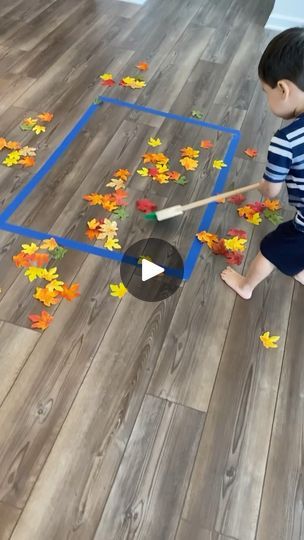 5.3K views · 2.7K reactions | 🍂 SAVE!!🍂-Easy Toddler Activity! 🍂

Looking for an easy activity indoor for your toddler?? Just put some painters tape on the ground and add some fake leaves! Have them “rake” the leaves into the square.

This helps with practical life experience and it keeps your toddler busy! It’s the perfect rainy day activity. 

The leaves are from the dollar tree!

❤️ DOUBLE TAP❤️ if you will try this and SAVE for later!!

🍂🍂🍂🍂🍂🍂🍂🍂🍂🍂🍂🍂🍂🍂
#montessoritoddler #montessori #practicallife
#montessoripracticallife #invitationtoplay #practicallifeskills  #preschooler #rainydayplay #grossmotorskills #fallplay | Emily Yang Toddler Fall Festival Activities, Halloween Gross Motor Activities, Dollar Tree Toddler Activities, Thanksgiving Toddler Activities, Kid Fun Activities, Fall Toddler Activities, Preschool Seasons, Fall Festival Activities, Harvest Activities