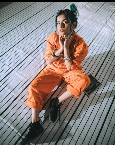 Gujju Unicorn, Mrunal Panchal, Prison Jumpsuit, Prison Outfit, Photo Walls, Female Cop, Branding Photoshoot Inspiration, Tic Toc, Sitting Poses