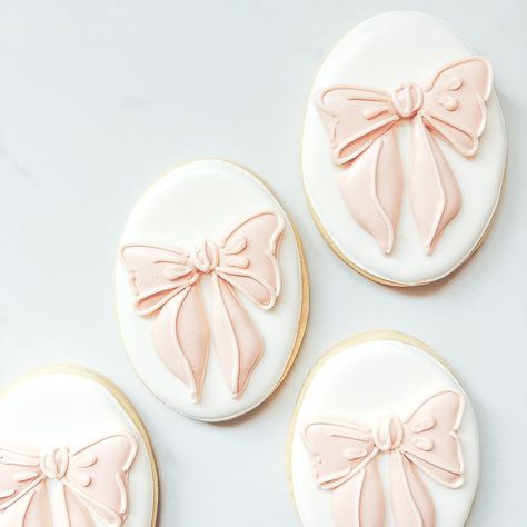 Obsessed with this bow trend and wishing I’d last forever!!✨🎀 #bowcookies #bowscookies #houstonbakery #houstontreats | Instagram She’s Tying The Knot Bow Theme Cookies, Pink Ribbon Cookies, Coquette Cookies Decorated, Sweetheart Baby Shower Cookies, Pink Bow Cookies Decorated, Bow Sugar Cookies Royal Icing, Pink Bow Baby Shower Cookies, Bow Baby Shower Cookies, Love Shack Fancy Cookies