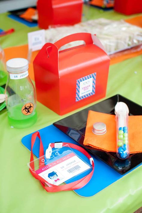 Dr. Joshua's Science Party | CatchMyParty.com Science Themed Birthday Party, Science Birthday Party Ideas, Science Birthday Party, Mad Science Party, Scientist Birthday, Project Mc2, Mad Scientist Party, Scientist Party, Birthday Party Places