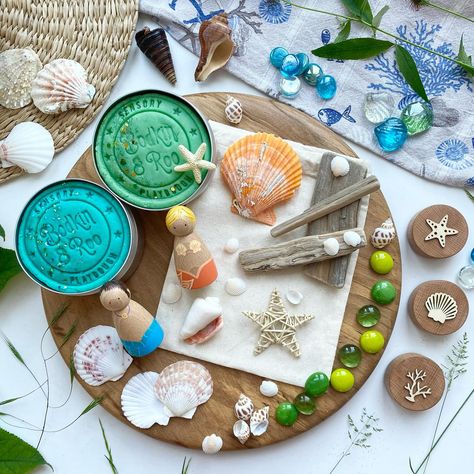 🧜🏽‍♀️MERMAID PLAYDOUGH KITS. 🧜🏽‍♀️ . 🐚Our Mermaid Kit has been a customer favourite since the very beginning! . 🧜🏽‍♀️Its had many variations over the years…. . 🐚Swipe to see. . P.S The summer launch is coming VERY soon, stay tuned for more! 🧜🏽‍♀️ ☀️ 🍦 🐠 🐋 🐚 🪸 . ✨ ✨ ✨ #mermaidplaydough #mermaidactivities #playdoughfun #playdoughkit #activitiesforkids #letskeepkidsbusy #plasticfreeplay #woodentoys #pegdollplay #plasticfreepackaging #loosepartsplay #learningthroughplaydough #learningwiththesm... Mermaid Playdough, Sensory Playdough, Playdough Creations, Keeping Kids Busy, Playdough Activities, Playbased Learning, Summer Play, Playdough Kits, Early Learning Activities