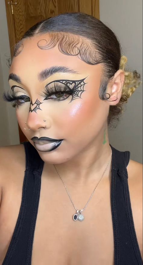 Artist Makeup Looks, Spiderweb Makeup Looks, Ghostface Eye Makeup, Demon Slayer Make Up, Graphic Liner Halloween, Spiderweb Liner, Halloween Makeup Looks Cute, Spiderweb Face Paint, Bone Makeup