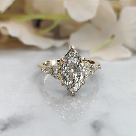 𝐒𝐭𝐨𝐧𝐞 : 𝐋𝐚𝐛 𝐆���𝐫𝐨𝐰𝐧 𝐃𝐢𝐚𝐦𝐨𝐧𝐝 (𝐈𝐆𝐈 𝐂𝐞𝐫𝐭𝐢𝐟𝐢𝐞𝐝 ) →Shape: Marquise Cut  →Weight: 2.00 Carat  →Color: F →Clarity : VS1 →Polish/Symmetry - Ex/Ex →Fluorescence - None →Side Accent Diamond Shape: Round & Marquise Cut →Side Accent Diamond Weight: 0.62 Ct 𝐌𝐞𝐭𝐚𝐥 𝐓𝐲𝐩𝐞:  925 Sterling Silver  Solid 14K/18K Gold 950 Platinum 𝐖𝐡𝐚𝐭 𝐖𝐢𝐥𝐥 𝐘𝐨𝐮 𝐆𝐞𝐭 ? ●Your Dream Ring. ●Beautiful Ring Box. ●Free Engraving. ●Original IGI Certificate. ~ ɪꜰ ʏᴏᴜ ᴡᴏᴜʟᴅ ʟɪᴋᴇ ᴛᴏ ᴠɪᴇᴡ ᴛʜᴇ ᴄ Propose Ring, Pretty Engagement Rings, Cute Engagement Rings, Marquise Ring, Pave Engagement Ring, Dream Engagement, Dream Engagement Rings, Payment Plan, Diamond Wedding Ring