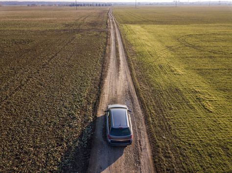 Aerial view of car driving by straight g... | Premium Photo #Freepik #photo #car Car From Above, Point Of View Shot, Car Shots, Car On The Road, Pink Tax, Car Commercial, Cloudy Bay, Car Vibes, Scene Ideas