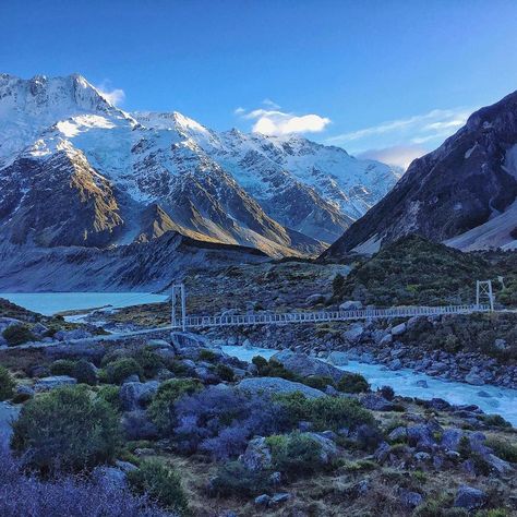 Hooker Valley tramp, Fiordland, New Zealand #googleguides #fiordlandNZ Wayne@10stopphotography.co.nz (@10stopphotography) on Instagram: “One of the many swing foot bridges along the Hooker valley trail as you walk the trail to get to…” Aoraki Mount Cook, Nz Travel, Mount Cook, New Zealand Houses, Oceania Travel, Dream Vacations Destinations, Virtual Travel, New Zealand Travel, Landscape Nature