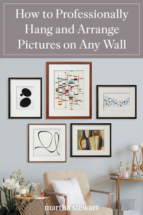 We share the professional way to arrange and hang frames on any wall in your home. Use these expert tips and tricks to help you create a gallery wall or hang a single framed print or photograph. Plus, the tools you will need. #hometour #homedesign #homedecor #marthastewart #inspiration #details Arrange Pictures, Hanging Pictures On The Wall, Small Apartment Decorating Living Room, Picture Arrangements, Photo Arrangement, Picture Gallery Wall, Minimalist Living Room Decor, Gallery Wall Layout, Designed Wall