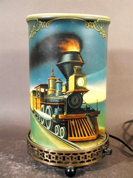 We had this lamp when I was growing up... Train Lamp, Carriage Lamps, Moving Train, Motion Light, Fish Lamp, Motion Lights, Mid Century Lamp, Retro Lamp, Kids Growing Up