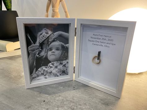 Instead of putting a lock of hair in a bag or box, use a double shadow box/picture frame and include a photo of the haircut and information about when and where the haircut was. First Haircut Keepsake, Shadow Box Picture Frames, Tiny Hair, Baby Shadow Box, Hair Keepsake, Baby Shower Announcement, The Haircut, Lock Of Hair, Deep Frame