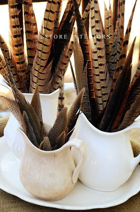 Pheasant feather fall decor | 9 Fresh Looks At Fall Decor  http://storyboardwedding.com/9-fall-decor-looks/ Entry Buffet, Country Thanksgiving Decorations, Pheasant Feather Decor, White Pitchers, Dipped Feathers, Thanksgiving Floral, Holiday Decor Thanksgiving, Farmers Wife, Pheasant Feather