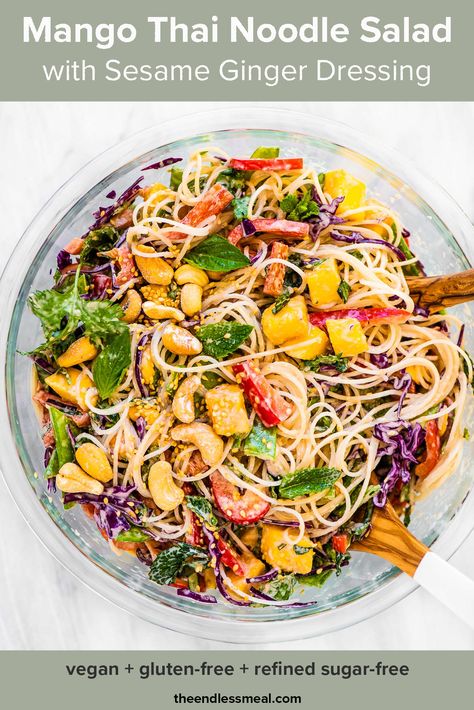 PIN TO SAVE FOR LATER! This Thai noodle salad is full of sweet mangos, snow peas, red pepper, loads of fresh herbs, and the most delicious creamy sesame ginger dressing. It's a cold pasta salad that keeps well for quick lunches or to take on a picnic. You'll love it! #theendlessmeal #thainoodlesalad #thaisalad #salad #thai #noodlesalad #pastasalad #thaipastasalad #mangos #picnicrecipes #saladrecipes #thairecipes #noodlerecipes #sugarfree #refinedsugarfree #vegetarian #vegan Salad With Sesame Ginger Dressing, Mango Thai, Thai Mango Salad, Thai Noodle Salad, Asian Noodle Salad, Sesame Ginger Dressing, Juicy Baked Chicken, Noodle Salad Recipes, Vegetable Noodles