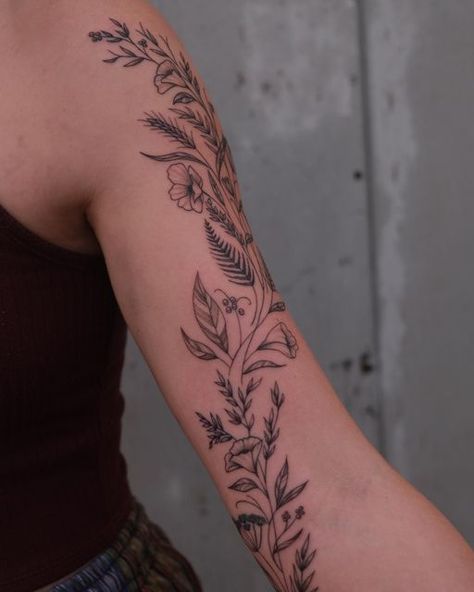 Flower Wrap Around Tattoo Shoulder, Wild Flower Wrap Around Tattoo, Wrap Arm Tattoos For Women, Plant Arm Sleeve Tattoo, Vine Arm Sleeve, Wrap Around Floral Tattoo, Wildflower Sleeve Tattoo, Tattoo Rework, Western Floral Tattoo