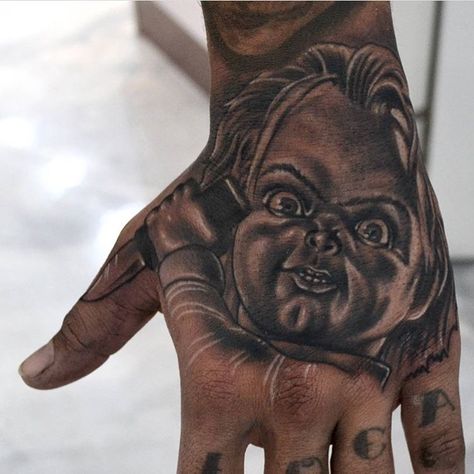 Chucky Hand Tattoo by Daniel Clark Beautiful BodyArt in pakenham Melbourne Australia Chucky Chest Tattoo, Chucky Tattoo On Hand, Ape Hand Tattoo, Chucky Tattoo Hand, Chucky Tattoos, Bad Face Tattoos, Chuckys Bride, Tattoos Horror, Tattoo Movie