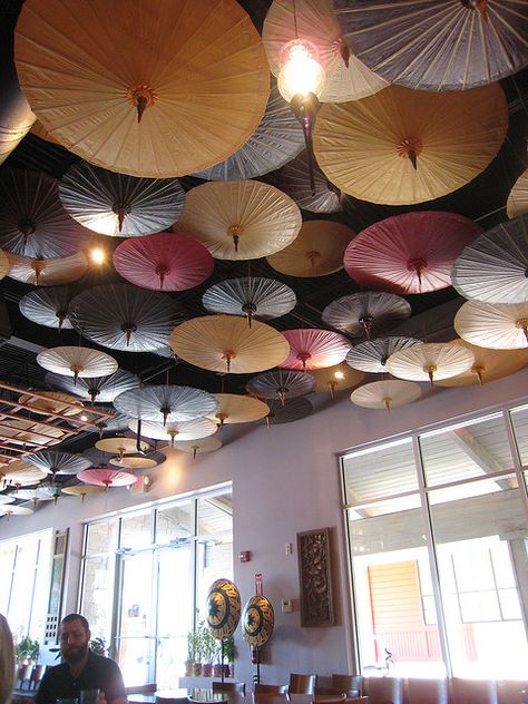 Parasols are such a fun way to decorate for any wedding or event! Find them for rent and /or sale at splendorforyourguests.com!  Splendor for Your Guests | Rental Company | Weddings | Events | Shawls | Blankets | Umbrellas | Parasols | Fans Umbrella Ceiling, Paper Parasol, Umbrella Decorations, Japanese Umbrella, Desk Layout, Paper Umbrellas, Umbrellas Parasols, The Ceiling, Ceiling Decor