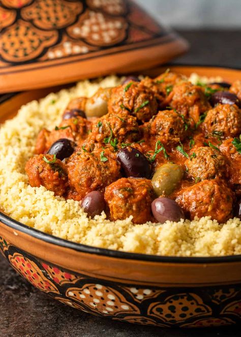 Moroccan meatballs are made with ground meat, onions, and herbs, and served with a flavorful tomato sauce. Pair with olives and couscous! Moroccan Birthday, Moroccan Meatballs, Moroccan Recipes, Moroccan Cooking, Middle East Recipes, Moroccan Dishes, Filling Dinner, Moroccan Food, Lip Swatches