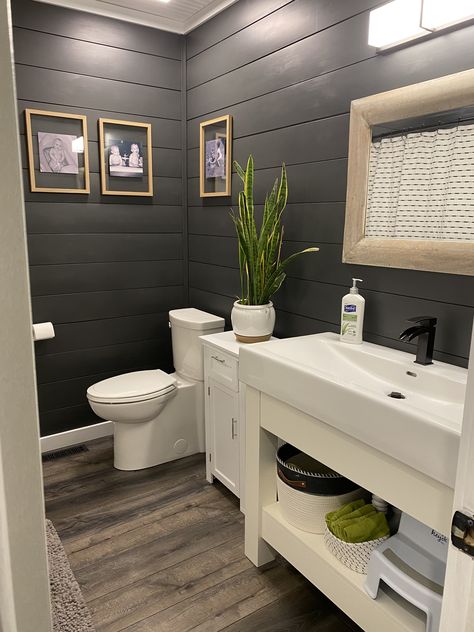 Dark Gray Shiplap Bathroom, Shiplap Wallpaper In Bathroom, Mobile Home Restroom Ideas, Half Bath Wood Paneling, Wood Wall Bathroom Ideas, Basement Half Bathroom Ideas, Gray Shiplap Bathroom, Charcoal Bathroom Walls, Dark Shiplap Bathroom