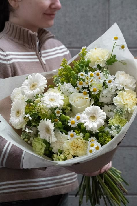 What inside: Gerberas, Daisies, Carnations   This summer flower bouquet is inspired by the charming meadows of the Northern California and a Silicon Valley. This bouquet features a delightful mix of bright yellow and flowers of pastel colors that capture the essence of summer perfectly. Aethstetic Flowers Bouquet, Daisies Flower Bouquet, Bouquet Of Flowers Daisy, Natural Bouquet Flowers, Medium Bouquet Flowers, Yellow Carnation Bouquet, White And Yellow Flower Bouquet, Wedding Flowers With Daisies, Flower Bouquet Inspiration