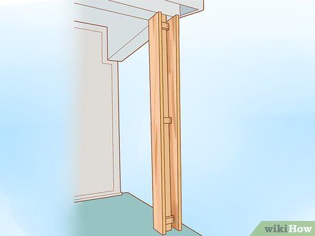 How to Wrap Porch Posts with Wood: 13 Steps (with Pictures) How To Cover Front Porch Posts, Porch Post Wraps Wood, Wrapping Metal Posts With Wood, Wrapping 4x4 Posts With Wood, How To Wrap Porch Posts With Cedar, Wrap Pillars With Wood, Cover Pillars With Wood, How To Wrap Porch Posts Wood, Porch Support Posts