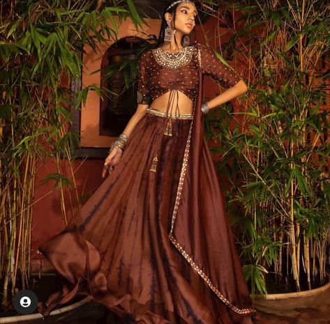 #designer brown lehenga dress Brown Lehnga Outfit, Brown Lehenga Chocolate, Silk Lehenga Designs, Trendy Lehenga Designs, Brown Lehenga, Lehenga Color Combinations, Beautiful Lehengas, Plain Lehenga, Ruffle Lehenga