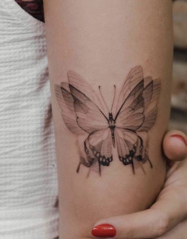 Fluttering Illusions: Mesmerizing 3D Butterfly Tattoo Designs for Inked Elegance Check more at https://ideatatto.com/drawings/fluttering-illusions-mesmerizing-3d-butterfly-tattoo-designs-for-inked-elegance/ 3d Butterfly Tattoo Designs, Geometric Tattoo Butterfly, Detailed Tattoos, 3d Butterfly Tattoo, Back Of Arm Tattoo, Popular Characters, Butterfly Tattoo Designs, 3d Butterfly, 3d Butterflies