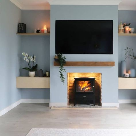 Farwa - Home Decor & DIY on Instagram: "Ad DIY FAUX FIREPLACE 🔥 Shes finished!! Who says newbuilds can't have character 😅 so so in love with this space now, and with our gorgeous @dimplex_uk electric fire. We were on the hunt for an electric fire that looked as realistic as possible and this Dimplex Gosford Optimyst stove definitely looks like a real fire. Love how cosy it is in here now 🥰 Ad PR product - @dimplex_uk Gosford Optimyst electric fire Previous pr products @sassandbelle . . . #chi Electric Stove Media Wall, Dimplex Optimyst Fireplace Ideas, Fire Under Tv, Optimyst Fire, Electric Stove Fireplace, Neutral Lounge, Diy Faux Fireplace, Dimplex Electric Fireplace, Fire Love