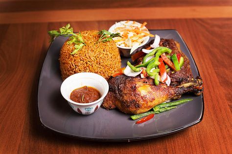 Get affordable authentic Ghanaian food with a contemporary dining experience only at The Chop Bar. We are situated in one of the most exclusive areas in Accra. Nigerian Rice, Ghanaian Dishes, Ghana Food, Ghanaian Food, African Recipes Nigerian Food, Carribean Food, African Dishes, Plating Ideas, West African Food