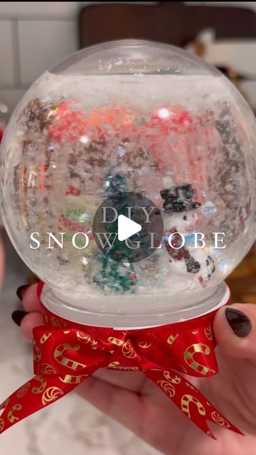 grace hewitt on Instagram: "DIY Snowglobe ☃️🎄❄️
#christmasdiy
#christmas #christmasdecor #holidayseason #christmascountdown #christmasdecorating #dollartree #dollartreediy #DIY #asmr #asmrtiktoks #asmrsounds" How To Make A Snow Globe, Snowglobe Diy, Waterless Snow Globe Diy, Diy Snowglobe, Snow Globes Diy, Snowglobe Craft, Snow Globe Diy, Homemade Snow Globes, Waterless Snow Globe