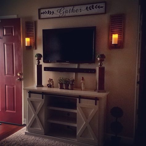 My front room. TV stand from Wayfair. Sconces from Hobby Lobby. Room Tv Stand, Front Room, Hobby Lobby, Tv Stand, Lobby, Flatscreen Tv, Flat Screen, Apartment, Living Room