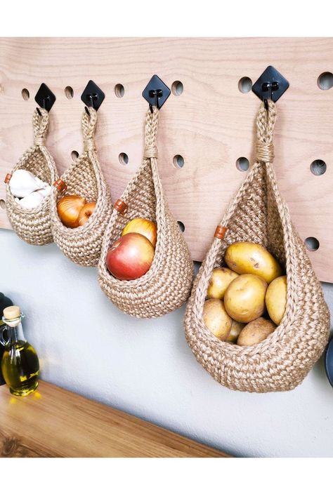 These baskets are really decorative and natural. Hanging baskets are made of jute. This is a natural eco-friendly material. You can store onions, potato, apple, garlic, nuts or fruits in this hanging baskets. Set of baskets also good as a plant holder. You can put other materials according to your needs. Please pay attention to the size of the baskets and make sure you choose the size you need. Store Onions, Hanging Wall Baskets, Kitchen Basket, Rustic Baskets, Jute Hanging, Wall Baskets, Jute Basket, Kitchen Baskets, Basket Sets