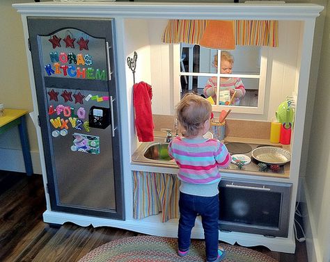 With the New Year upon us, it’s officially time to roll up our sleeves and get working on all of those DIY projects we set aside during the holidays. Whether you’re looking for a DIY way to spruce up your backyard or your living room — as with this gorgeous upcycled cedar table — the options are seemingly endless.... View Article Kids Entertainment Center, Cardboard Kids, Old Tv Stands, Diy Kids Kitchen, Diy Kids Furniture, Diy Entertainment, Play Kitchens, Kids Play Kitchen, Diy Furniture Redo