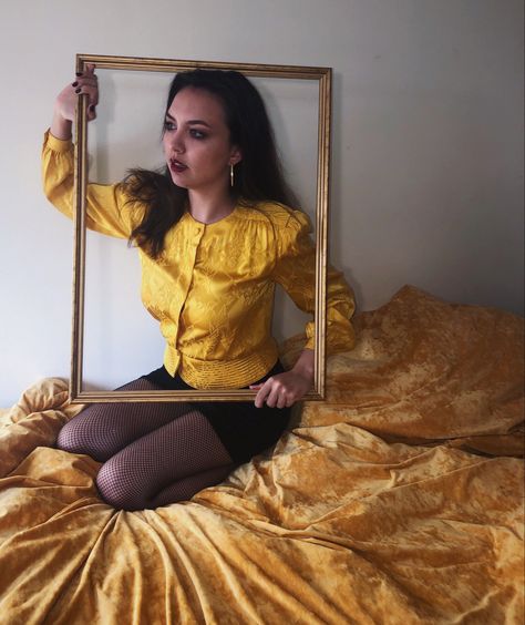 Me wearing a yellow long sleeve shirt and black fishnets and black skirt. I’m sitting on my yellow bed holding a yellow picture frame. Picture Frame Portrait Photography, Picture Frame Photoshoot, Aesthetic Picture Frame, Frame Photoshoot, Lisa Photoshoot, Idea Photoshoot, Royal Frame, Empty Frames, Photoshoot Idea