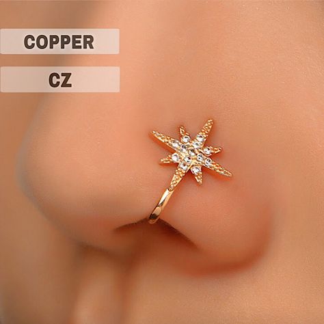 Fake Nose Piercing Nose Cuff Copper Gold Tone Clear Color Cubic Zirconia 8-Pointed Star Charm Size L 17/32” X W 7/16” X D 5/16” Fading / Tarnish Resistant Durable Single | Asymmetric Wearing No Piercing Required Lightweight 1 Pc / Lot Condition Nwt Mix & Match 3 Listings For $18 Queendomjewelry Btq 7k+ Sold Items 600+ Available Listings 4.9 Rating Fashion Costume Fake Faux Simulated Vegan Brand Basic Casual Metal Metallic Clip On Wrap Smooth Shiny Glossy Glistening Chic Gift Elegant Golden Yello Fake Nose Stud, Clip On Nose Ring, Nose Ring Designs, Nose Ring Indian, Heart Nose Rings, Piercing Clip, Fake Nose Ring, Nose Cuff, Faux Piercing