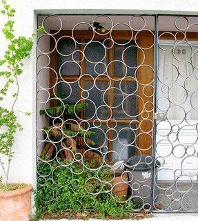 Metal Wall Art Circles - Foter Apartment Front Doors, Gate Pictures, Burglar Bars, Window Bars, Modern Gate, Metal Gates, Window Grill Design, Lan Can, Garden Gate