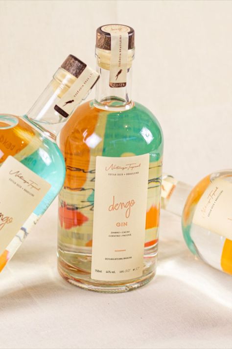 Stop And Stare At The Tropical Vibes Through Dengo Ginn's Packaging Soft Turquoise, Drinks Packaging Design, Craft Gin, Bottle Design Packaging, Alcohol Packaging, Wine Label Design, Orange Hues, Wine Packaging, Perfume Design