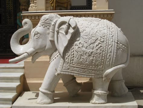 A elephant, beautifully hand carved out of white marble at a local stone mason's store in Jaipur, India. Marble Elephant, Elephant Home Decor, Elephant Carving, Wooden Front Door Design, Boho Art Drawings, Entrance Gates Design, Sculpture Art Clay, Indian Sculpture, Peace Illustration