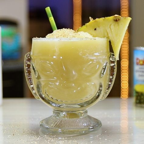 Frozen Painkiller - Tipsy Bartender Painkiller Drink Recipe, Frozen Alcoholic Drinks Recipes, Painkiller Drink, Painkiller Recipe, Malibu Cocktails, Painkiller Cocktail, Juice Pineapple, Fruit Slush, Coconut Ice