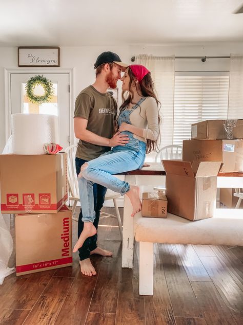 Moving couple married pregnant packing expecting Moving While Pregnant, Moving Out Pictures, Were Moving Announcement, We Are Moving Announcement Photo, Moving Announcement Ideas, Moving Outfit, We're Moving Announcement, Moving Photoshoot, Moving Announcement Photo