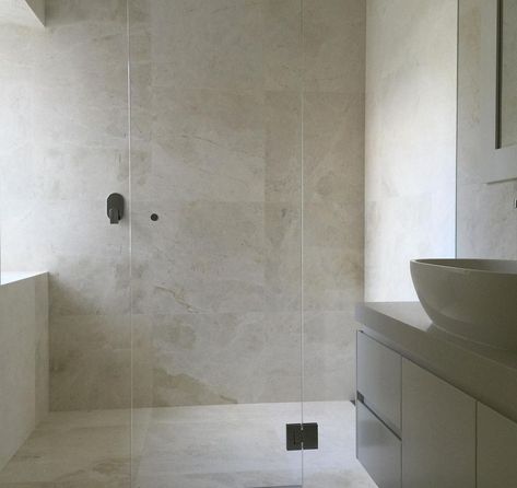 24/7 tile & stone on Instagram: “24/7’s Bianca Perla and Tundra Grey marble has warmer hues and subtle light and dark topographic inclusions enhancing the play of natural…” Gray Stone Bathroom, Paver Landscaping, Tundra Grey Marble, Marble Pool, Coping Tiles, Turkish Marble, Limestone Tiles, Designer Tiles, Travertine Tiles