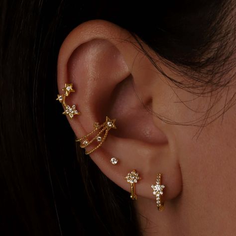 Star Themed Ear Piercings, Triple Lobe And Flat Piercing, Ear Piercings Diamonds, Space Themed Ear Piercing, Multi Earrings Piercing, Piercing Sets Ear, Silver Earrings Stack Aesthetic, Moon Helix Piercing, Celestial Ear Stack