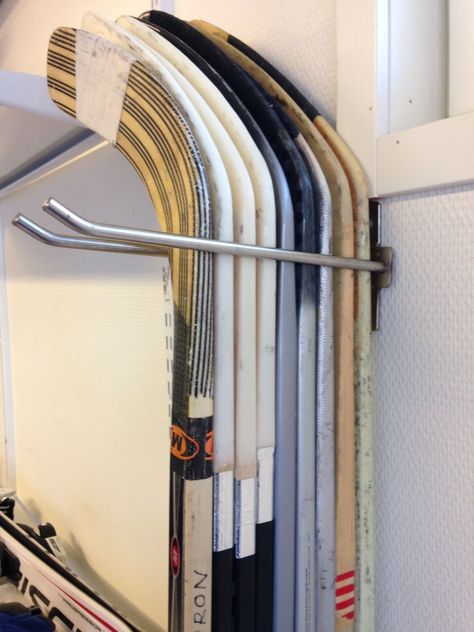 Hockey Stick Storage Ideas, Hockey Stick Storage Diy, Hockey Gear Organization, Hockey Stick Holder Diy, Hockey Stick Organization, Hockey Storage Ideas, Hockey Stick Holder, Hockey Gear Storage, Hockey Stick Storage