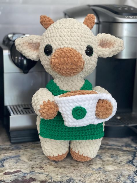 Crocheted pumpkin spice plushie cow with a coffee cup on his head dripping down coffee. He is pumpkin orange color and he is also holding a pumpkin. He is made out of super soft chenille yarn and is 16 inches tall. Crochet Plush Clothes, Cow Print Crochet, Thing To Crochet, Christmas Crochet Amigurumi, Crocheted Stuffed Animals, Chenille Crochet, Pumpkin Orange Color, Yarn Projects Crochet, Crochet Bears