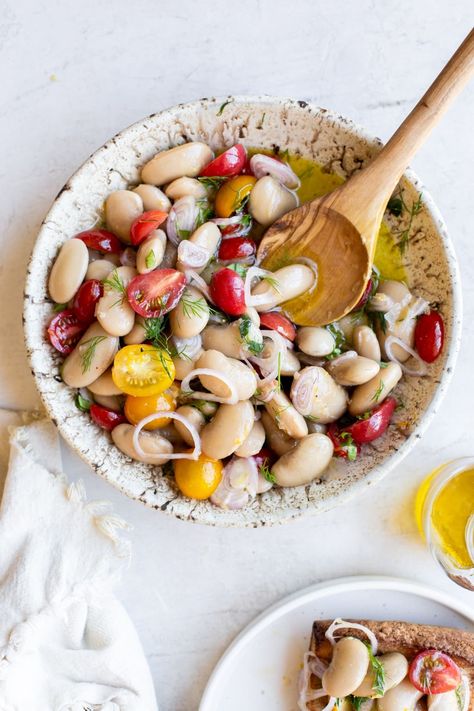 This Herby Marinated White Bean Salad is made with giant white beans, cherry tomatoes, sliced shallots, and lots of fresh herbs in a lemony marinade. Easy to make, no cooking necessary, and stays good for days in the refrigerator. Gluten-free & vegan. Medium Length Hair With Bangs, White Bean Salad, Navy Bean, No Cooking, White Wine Vinegar, White Bean, Bean Salad, White Beans, Medium Length Hair