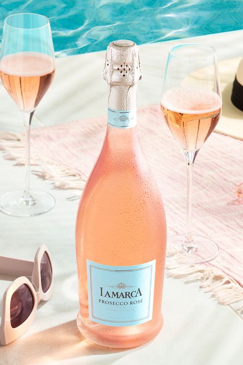 Prosecco Pool Party, Fun Floaties, Pool And Wine Aesthetic, Wine Campaign, Rose Prosecco, Campaign Moodboard, Wine At Beach Aesthetic, Lamarca Prosecco, Pink Prosecco