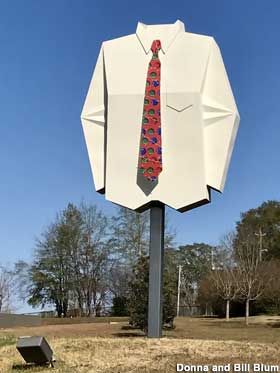 Andalusia, Al - Metal sign replica of a giant white shirt with a red necktie perched atop a pole as if being worn by an invisible man. Big White Shirt, Andalusia Alabama, Butler County, White Dress Shirt, Invisible Man, North And South America, Roadside Attractions, Andalusia, White Shirt Dress