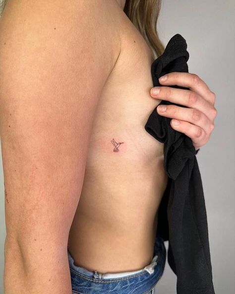 Hummingbird Tattoos | Tattoofilter Small Dainty Hummingbird Tattoos, Small Hummingbird Tattoo Fine Line, Bird Tattoo Side Ribs, Owl And Hummingbird Tattoo, Hummingbird Fineline Tattoo, Hummingbird Tiny Tattoo, Fine Line Humming Bird Tattoo, Humming Bird Fine Line Tattoo, Hummingbird Tattoo Ribs