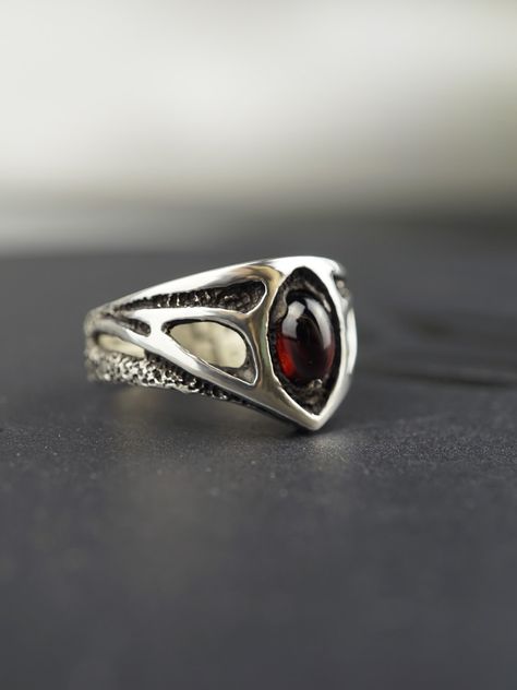 A unique silver engagement ring for men.  It is decorated with a natural Garnet stone. #garnet #gemstones #handmadejewelry #weddingrings #MOONIQUEcreation Engagement Ring For Men, Engagement Ring Alternative, Gothic Engagement Ring, Signet Rings Women, Unique Mens Rings, Garnet Ring Silver, Alternative Wedding Rings, Garnet Engagement Ring, Mens Gemstone Rings