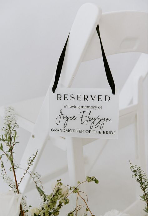 Introducing our acrylic reserved in loving memory sign, a heartfelt addition to your wedding ceremony. Crafted with meticulous attention to detail, this beautiful acrylic sign provides a touching way to honour and remember loved ones who are no long with you on your wedding day. Choose to have your in loving memory sign hanging from a chair, or placed on the chair or table using our acrylic or wooden base options. Our high-quality acrylic boasts durability while maintaining an elegant appearance How To Honour Loved Ones At Wedding, Reserved Seating Wedding In Memory, Memory Chair At Wedding, Memory Sign For Wedding, Reserved Seating Wedding, Memory Table Wedding, Sign For Wedding, Reception Sign, Memory Table