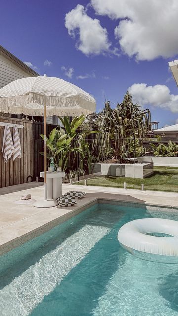 Lauren Magnus | Interiors • Home • Life on Instagram: "I get asked all the time about where we got our umbrella stand…… @bunnings hack for the win! I just used a $29 concrete umbrella stand from Bunnings gave it a coat of primer followed by white spray paint as an undercoat and topped it with @tint.paint in the colour Fika. Now she is a beautiful creamy beige to match my limestone pool and crazy pave. What do you think?? #diy #bunnings #bunningswarehouse #bunningsdiy #hack #bunningshack Limestone Pool, Crazy Pave, Pool Paving, Pool Paint, Outdoor Pool Area, Pool Landscape Design, Pool Cabana, Small Pool Design, White Spray Paint